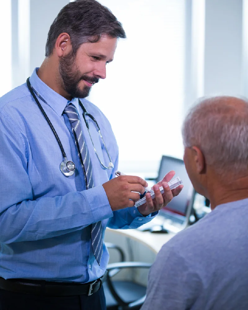 Clinician explaining next steps to a patient after an appointment