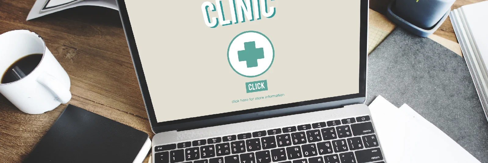 Laptop showing a clinic website page patients use to get in touch